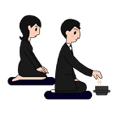 2.右手の親指と人差し指、中指で抹香をつまみ、眉間の高さまで上げてから香炉に落とします。